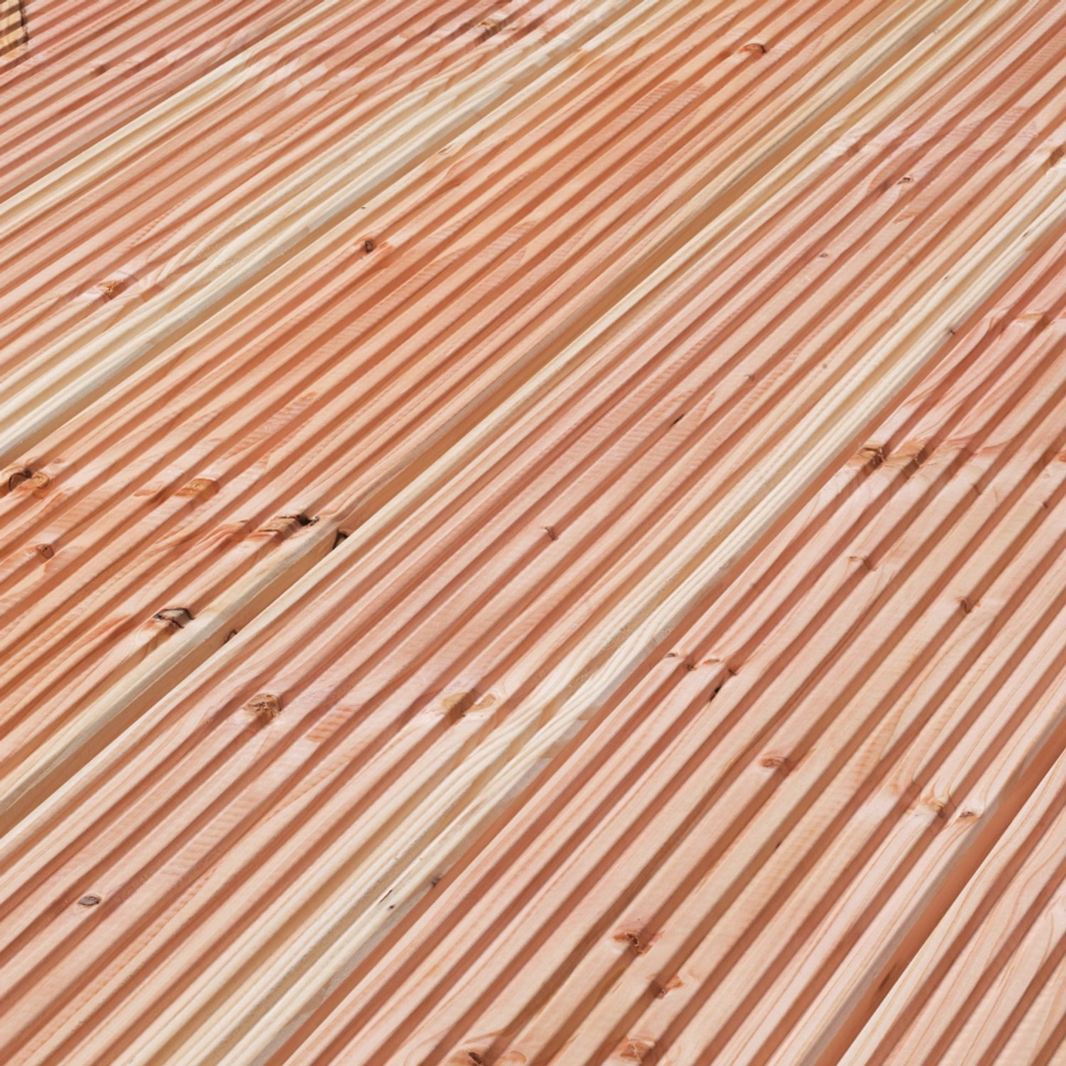 Listoni per terrazza in douglasia scanalata, aspetto legno naturale.