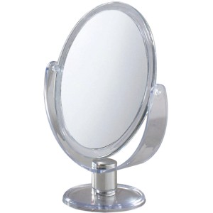 Specchio da trucco ovale t.b.t. con cornice trasparente e base color argento.