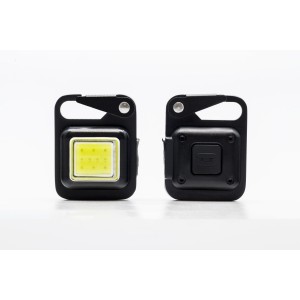Mini torcia nera t.b.t. con moschettone, ideale per portachiavi.