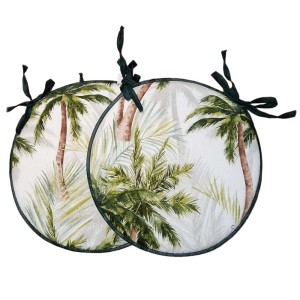Due cuscini da esterno rotondi con motivo a palme e lacci verdi.