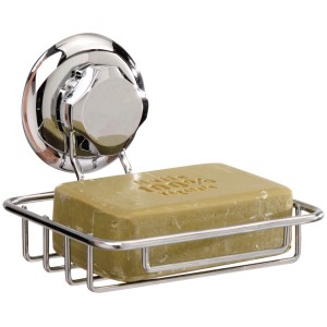 Dispenser sapone cromato con ventosa e sapone nella griglia.