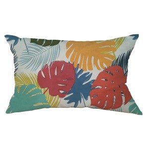Cuscino da esterno t.b.t. con foglie tropicali colorate.