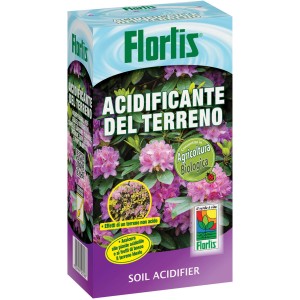 Confezione di fertilizzante per rododendri per acidificare il terreno con fiori rosa.