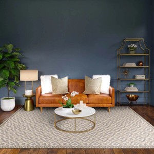 Tappeto moderno con motivo geometrico in beige e grigio.