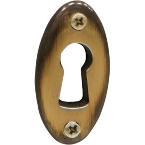 Bocchetta per serratura color ottone per mobili, forma ovale.