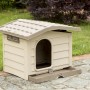 Cuccia per cani beige con tetto e mangiatoia per uso esterno.