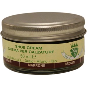 Crema da scarpe marrone in barattolo di vetro con coperchio argentato. Ideale per la cura delle scarpe da lavoro.