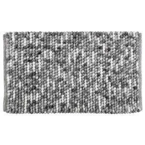 Tappeto grigio con texture a pallini per ambienti domestici.