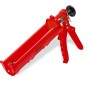 Pistola per silicone rossa per muratori e piastrellisti.