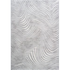 Tappeto moderno con motivo astratto ondulato nei toni del grigio e del bianco.