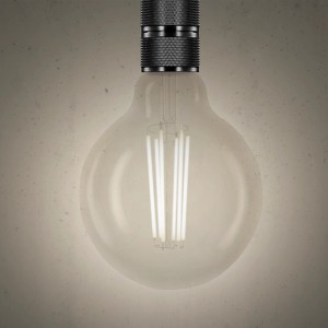 Lampadina LED E27 t.b.t. con bulbo in vetro trasparente e filamenti a vista.