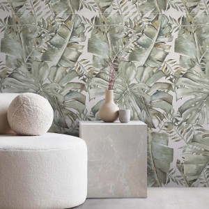 Piastrelle per pavimenti t.b.t. con design a foglie tropicali in toni di verde e beige.