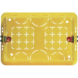 Scatola da incasso gialla con aperture per impianti elettrici.