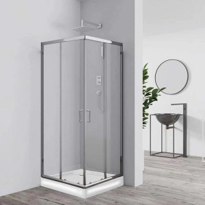 Box doccia angolare con profili grigi e porte in vetro.