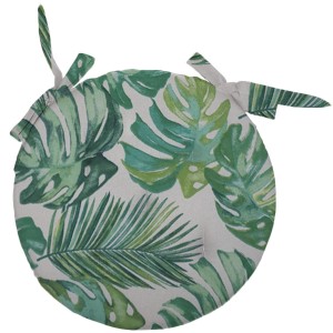 Cuscino rotondo per sedia con motivo a foglie tropicali e lacci.