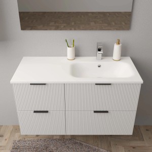 Mobile lavabo t.b.t. con lavabo e cassetti scanalati.