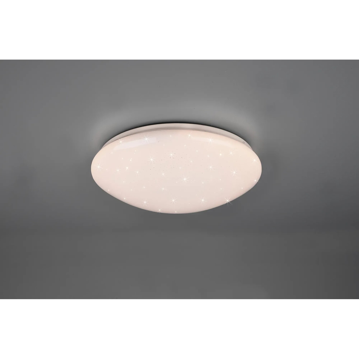 Plafoniera LED Reality Lukida bianca con effetto cielo stellato, adatta per soggiorno e camere da letto.