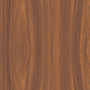 Primo piano di una pellicola adesiva t.b.t. con effetto legno.