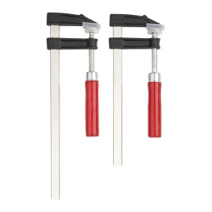 Set di 2 morsetti con manici rossi di diverse dimensioni. Utensili di serraggio per varie applicazioni.