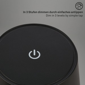 Dettaglio: Lampada da tavolo a batteria Brilo nera con dimmer touch e simbolo di alimentazione.