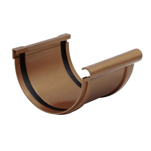 Grondaia in plastica marrone, vista dettagliata. Ideale per il drenaggio dell'acqua piovana.