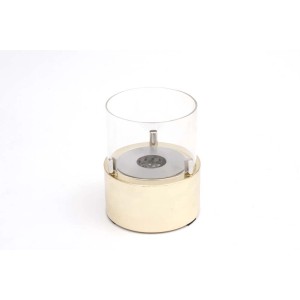 Camino decorativo t.b.t. con base dorata e cilindro in vetro.