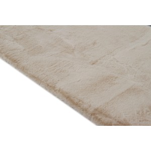 Tappeto a pelo lungo beige t.b.t. per un'atmosfera accogliente.