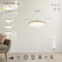 Plafoniera LED bianca con bordo in legno e telecomando.