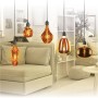 Diverse lampadine LED E27 t.b.t. in un ambiente domestico.