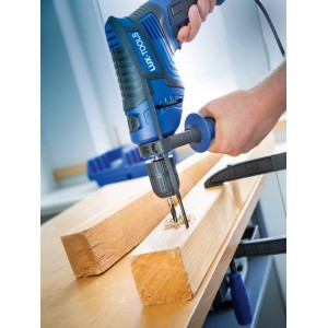 Trapano a percussione blu LUX E-BMS-21 con arresto di profondità che fora il legno.