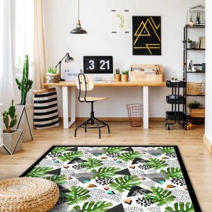 Tappeto moderno con motivo a foglie tropicali in soggiorno.