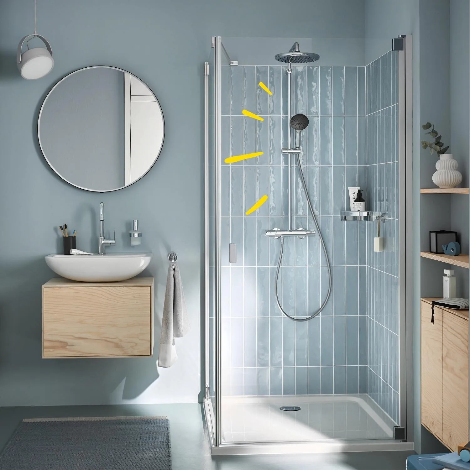 Sistema doccia Grohe Vitalio Start 250 con termostato cromato, soffione rotondo in bagno.