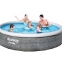 Piscina Bestway Fast Set con famiglia in acqua. Piscina fuori terra con design rattan grigio.