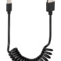Cavo a spirale nero con connettori USB-A e USB-C per interni auto.