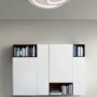 Plafoniera LED t.b.t. moderna con design curvo per montaggio a soffitto.