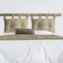 Letto con cuscini t.b.t. beige e cuscino decorativo verde oliva.