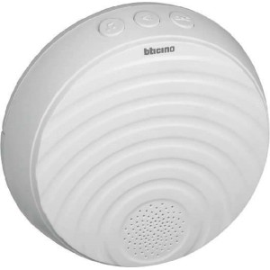 Distributore di suonerie Campanelli bianco e rotondo di t.b.t. con altoparlante e pulsanti.