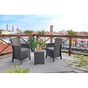 Set di mobili da giardino t.b.t. grigio con due sedie e un tavolo su una terrazza con vista sulla città.