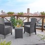 Set di mobili da giardino t.b.t. grigio con due sedie e un tavolo su una terrazza con vista sulla città.