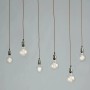Plafoniera Luce Design Groove color rame con sei lampadine.