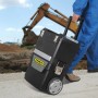 Officina mobile nera Stanley 1-93-968 con manico telescopico e ruota grande.