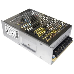Alimentatore per strisce LED, alloggiamento in metallo con fori di ventilazione e morsetti di collegamento.