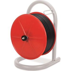 Dispenser rosso per reggia con reggia nera su supporto grigio.