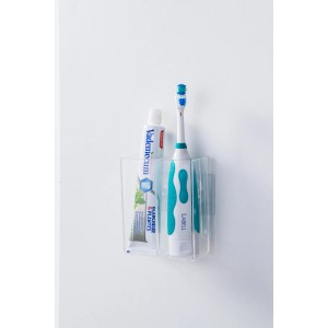 Porta accessori bagno trasparente con spazzolino e dentifricio. Accessorio per mobili bagno.