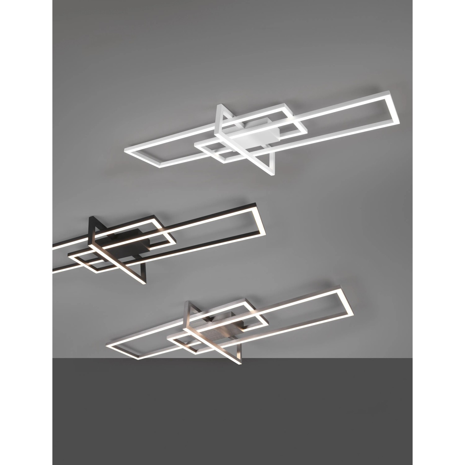 Plafoniera LED Trio Salinas in nero, bianco e argento con design geometrico.