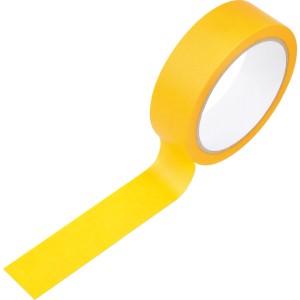Rotolo di nastro adesivo Washi giallo, parzialmente srotolato. Materiale di copertura per pittura.
