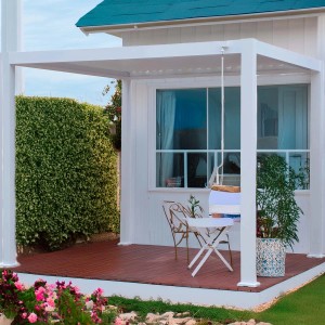 Gazebo bianco t.b.t. con tavolo e sedie su un patio.