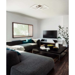 Plafoniera LED moderna t.b.t. con due luci quadrate in soggiorno.