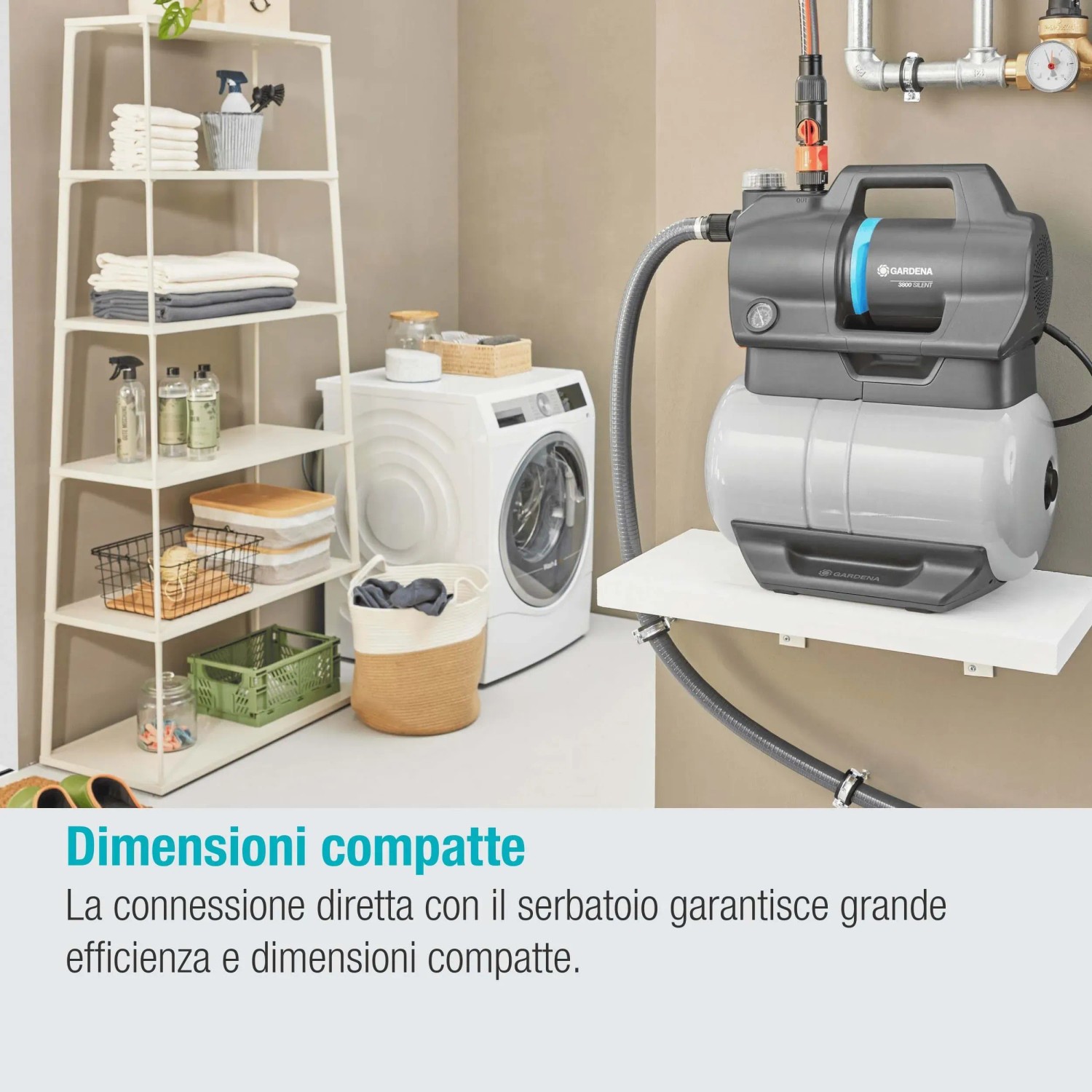 Pompa da giardino grigia in lavanderia. Pompa elettrica per casa e giardino.