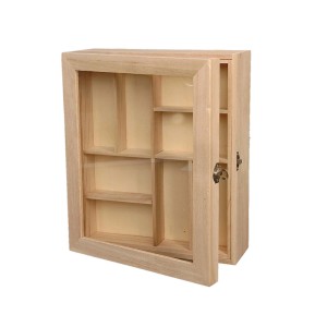 Scatola in legno con scomparti per accessori artistici, anta aperta.